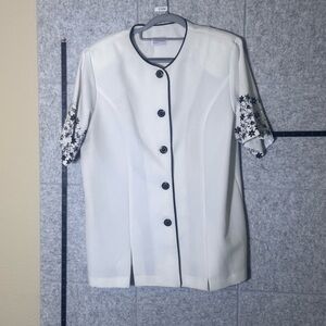 Chic White Button-Up Blouse with Black Floral Accents